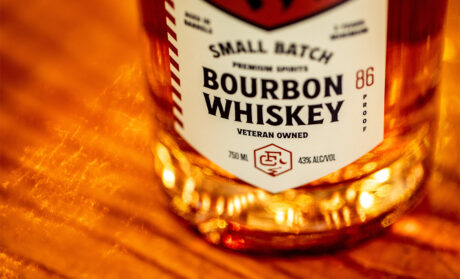 The label and bottle design for Fancy Creek’s small batch bourbon was shaped to reflect the veteran-founded brand’s attention to craft and quality. Every detail was considered to feel premium while staying true to the company’s roots. Fancy Creek vodka label by FUEL, branding for Quad Cities veteran-founded spirits.