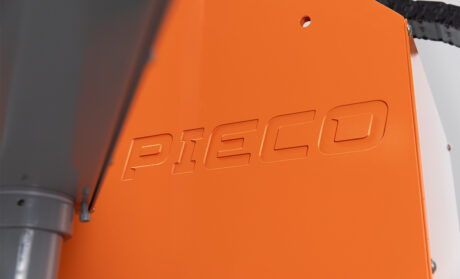 Rugged logo for PIECO, an Iowa-based global meat processing innovator. Embossed in iron, amplifies industrial strength with bold branding. PIECO logo by FUEL, embossed on Iowa-based global meat processing equipment.