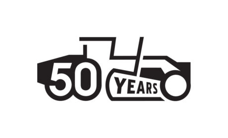 Anniversary mark for the 50th anniversary of the John Deere motor grader, designed for John Deere Construction, a heavy industrial construction equipment manufacturer located in Moline, Illinois. John Deere Motorgrader 50-year Anniversary