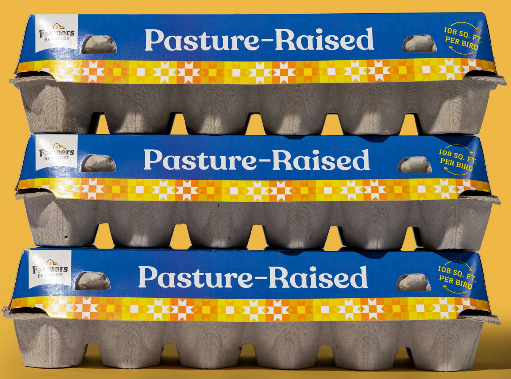 Three stacked pasture-raised egg cartons