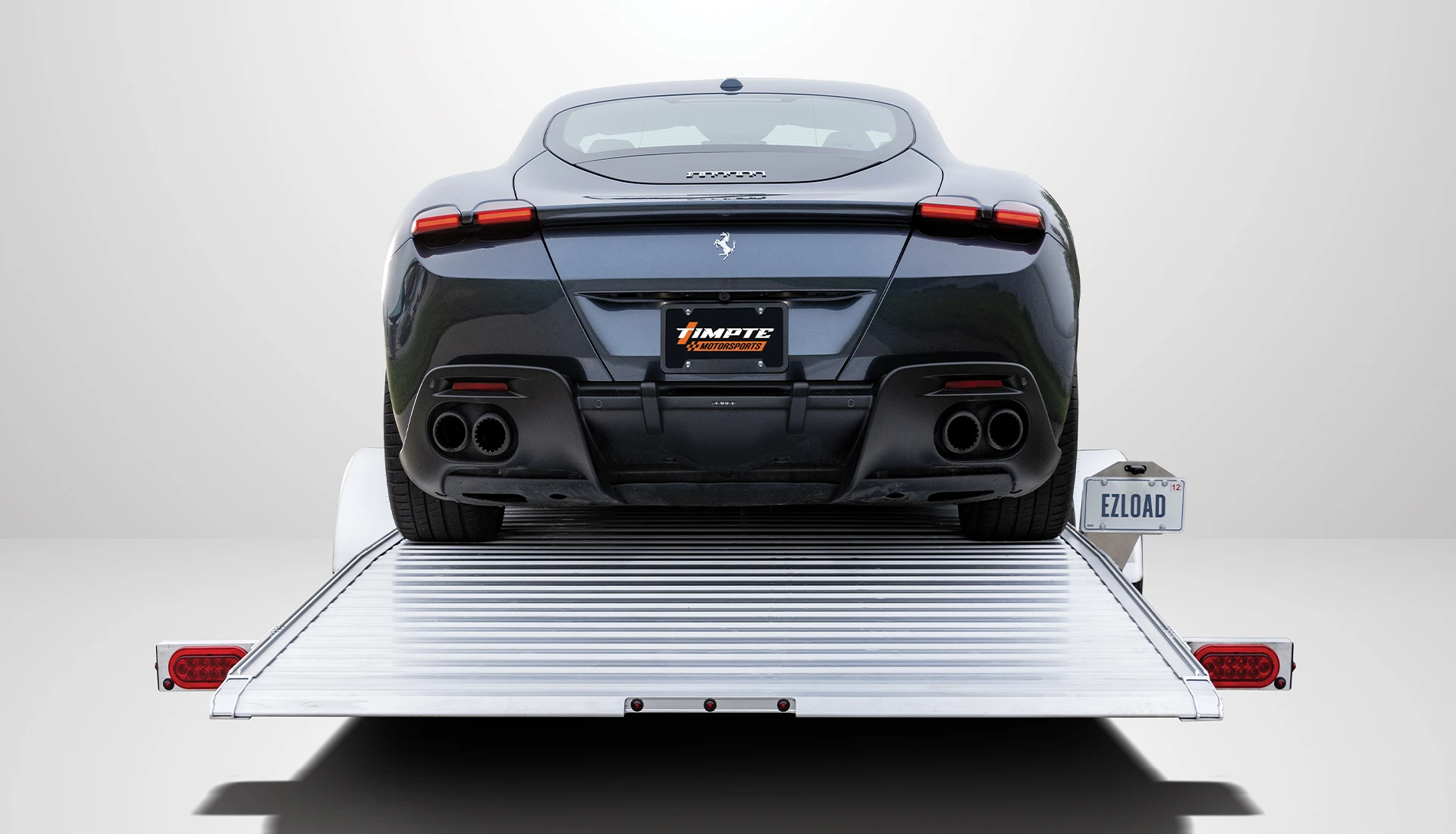 Supercar on Timpte equipment trailer