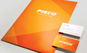 Folder and business card designed for PIECO, an engineering consultant and manufacturer serving the meat processing industry, located near Manchester, Iowa.