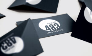 Logo and corporate ID designed for Studio 483, a design-focused architectural firm resulting from the merger of SGGM and Gere-Dismer Architects, with locations in Davenport, Iowa and Rock Island, Illinois. Studio 483 Architects business cards