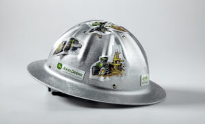 Series of Forestry equipment illustrations incorporated into sticker sheets designed for John Deere Forestry, a heavy industrial forestry equipment manufacturer located in Moline, Illinois. John Deere hard hat stickers