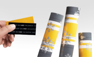 Construction Equipment themed Holiday wrapping paper designed for John Deere Construction, a heavy industrial construction equipment manufacturer located in Moline, Illinois. John Deere wrapping paper