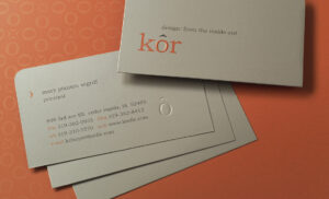 Business cards, naming and expressive pattern designed for kôr, a commercial interior designer and furniture sales firm located in Cedar Rapids, Iowa. kôr business cards and pattern